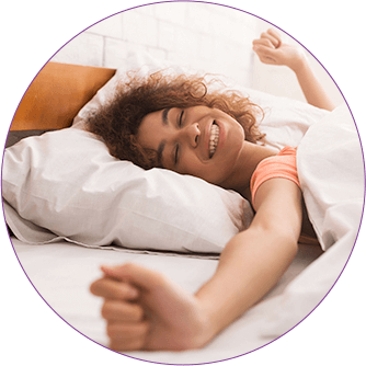 Refreshed woman waking up.