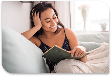 Image of woman reading a book.